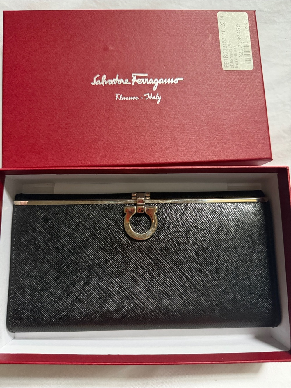 Salvatore Ferragamo Black Wallet with Gold Gancini Accent